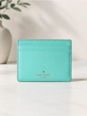 kate spade Turquoise Slim Card Case with Gold Logo